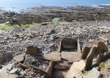 The stone tank and remains of other structures of the Meur burnt mound. You can see how close to the sea it is.